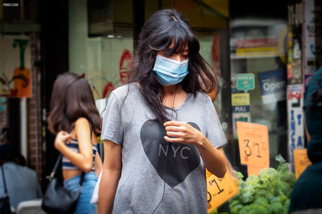 Young Woman in Surgical Mask and NYC Heart T-shirt